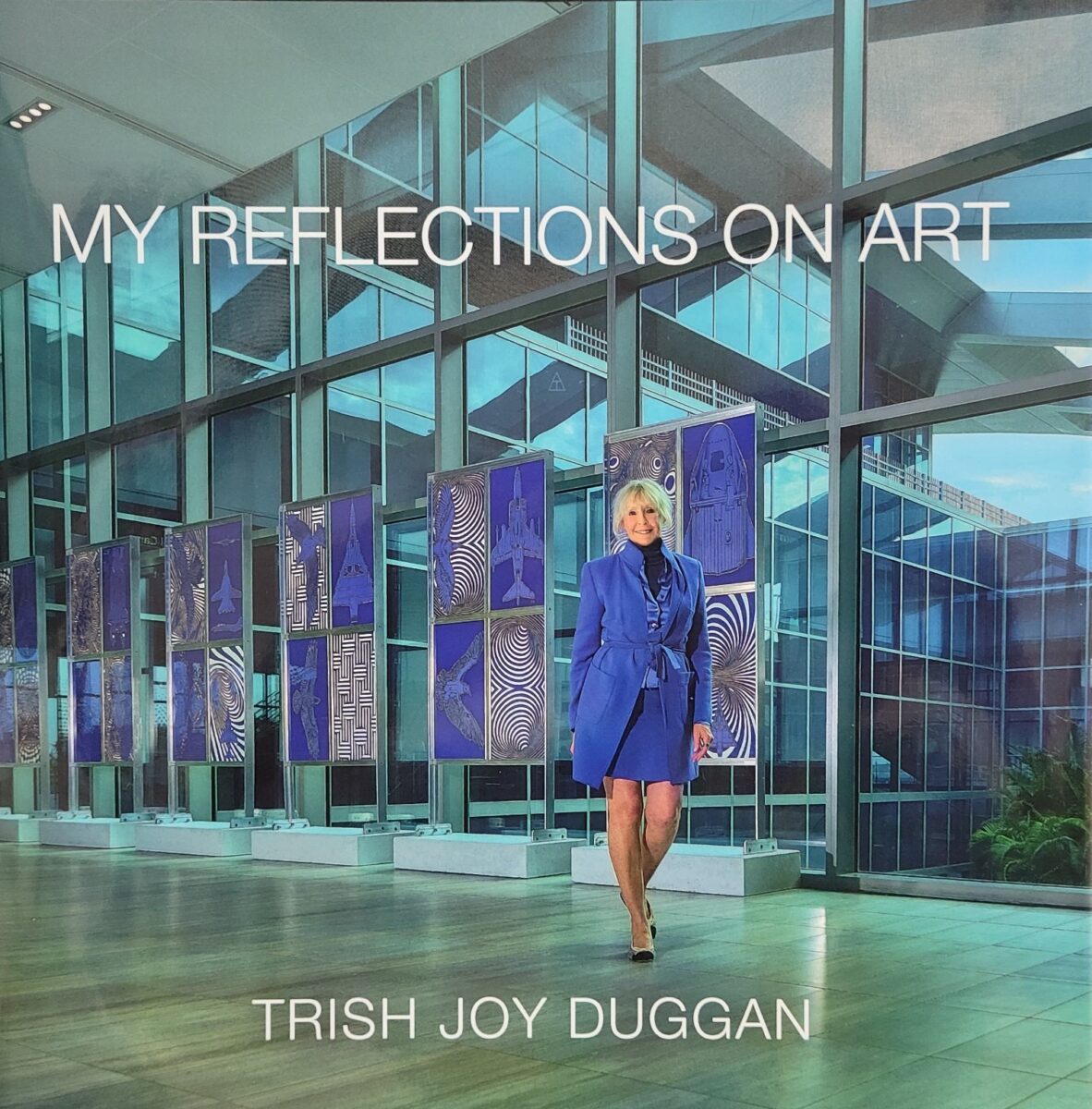 Trish Duggan showing her art pieces